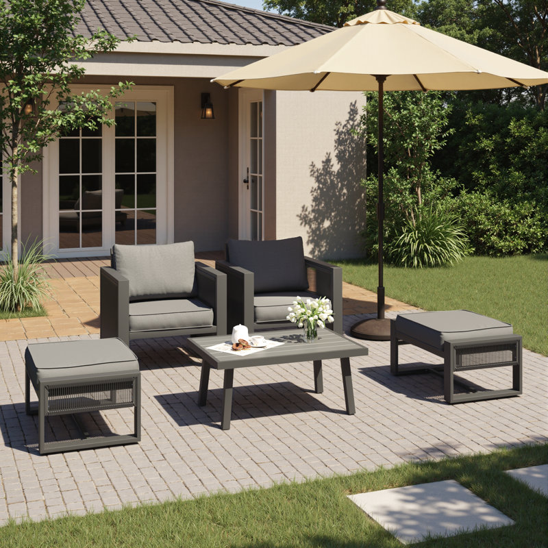 Ensemble de conversation pour patio en aluminium avec repose-pieds 4 personnes Harloe, Coussin gris / cadre noir