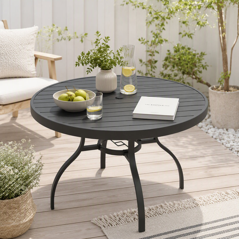 Table de salle à manger ronde noire de 104 cm (41 pouces), monobloc, moderne et polyvalente, idéale pour l'intérieur et l'extérieur, sur une terrasse ou un balcon d'appartement.
