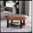 ROUND OTTOMAN-485992897