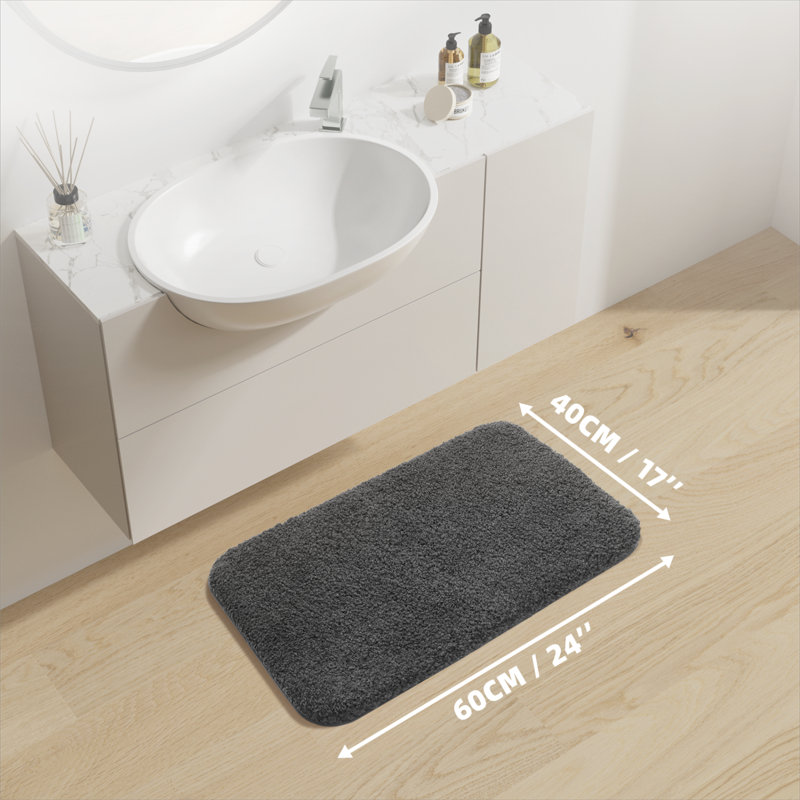 Tapis pour salle de bain Gaenside, L 24 po x l 16 po, Gris clair