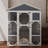 Outstanding Wooden Outdoor Cat House with Multiple Features for Pets