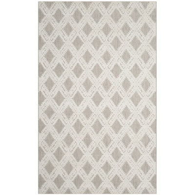 Tapis argenté / ivoire tissé à la main Chanelle