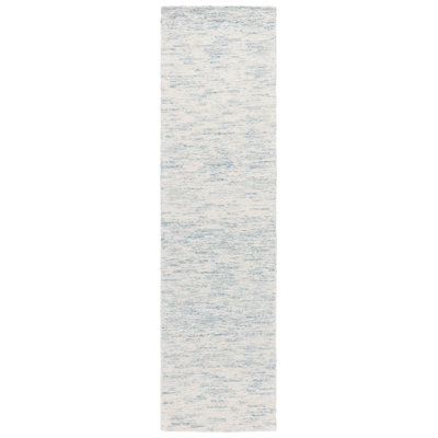 Touete Ebony Hand Tufted Wool/Cotton Abstract Rug in Ivory/Light Blue