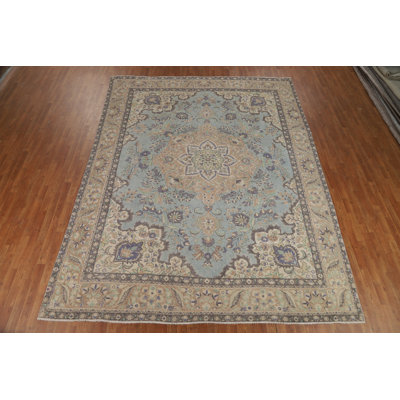 Tapis traditionnel médaillon bleu clair 9 x 12