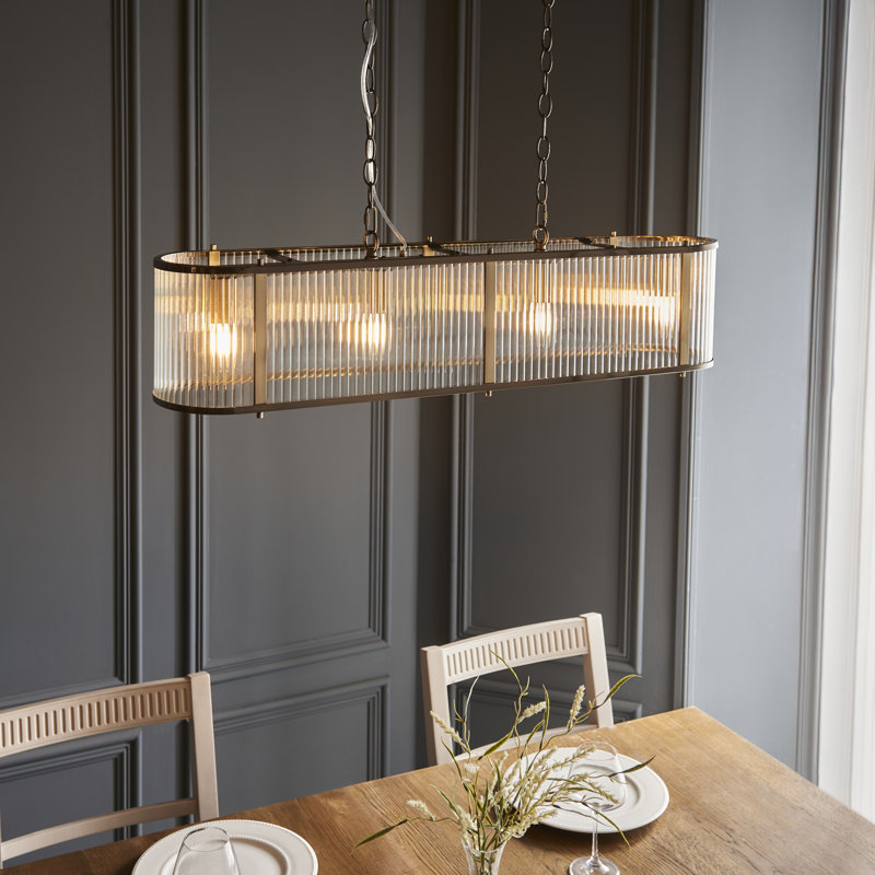 Anesty 4lt Linear Pendant light finished in Ant. Brass