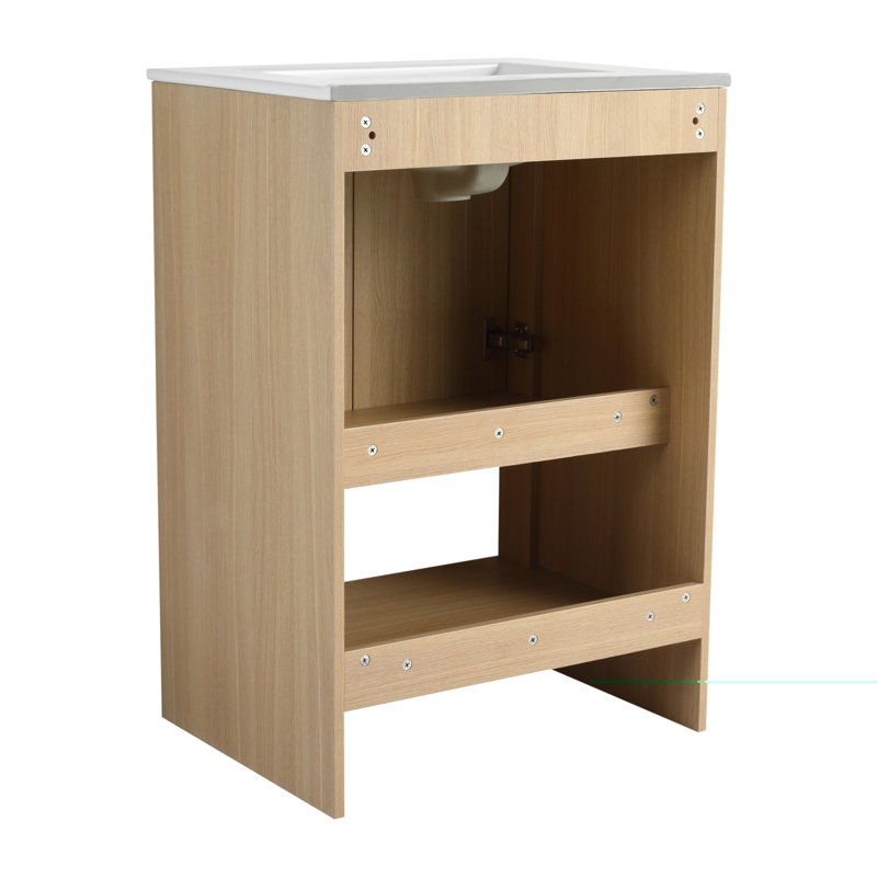 Meuble-lavabo autoportant de 24 po avec lavabo en céramique, portes à fermeture douce et fabrication en contreplaqué durable au fini chêne