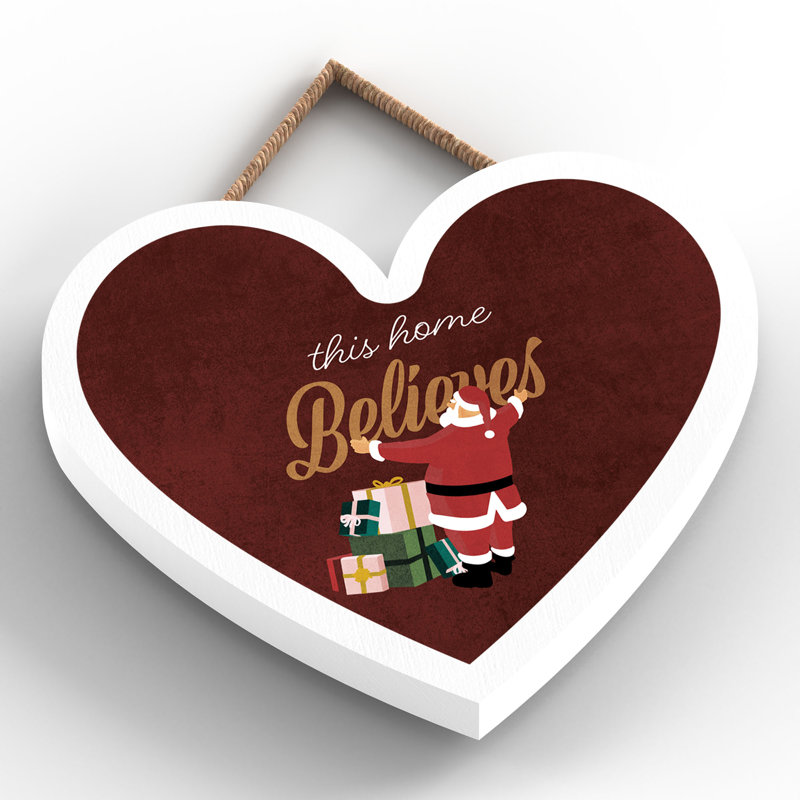 Xmas This Home Believes Santa Wooden Heart Plaque, 10cm H x 9cm W x 0.5cm D