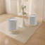 Repose-pieds avec tabouret pivotant en métal Juriana-96564406