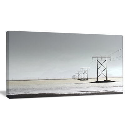 " Electricity Pylons Over Lagoon "