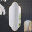 Élégant miroir mural décoratif avec bords entaillés pour une décoration intérieure élégante