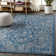 Leonora Bohemian Textured Weave Floral Navy/Gray Indoor/Outdoor Rug