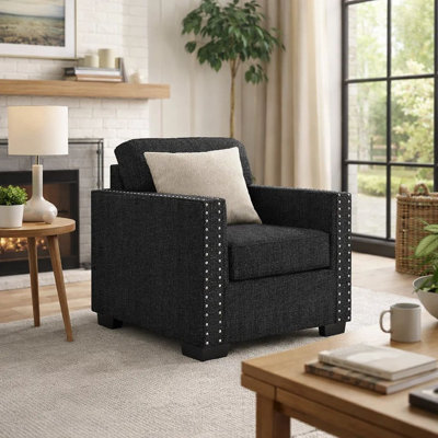 Fauteuil d'appoint Jez, polyester noir charbon avec garniture cloutée, base DEL