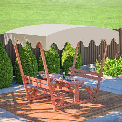 Table et banc de pique-nique d'extérieur en bois massif avec auvent amovible. Conçus pour résister aux intempéries et parfaits pour les patios, les jardins et les terrasses. Bancs de 3 cm d'épaisseur, robustesse de qualité professionnelle. Auvent imperméable et résistant à la pluie.