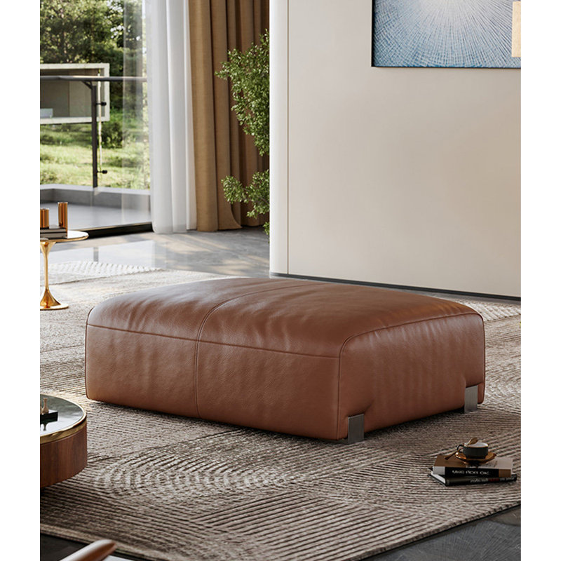 Repose-pieds en cuir brun