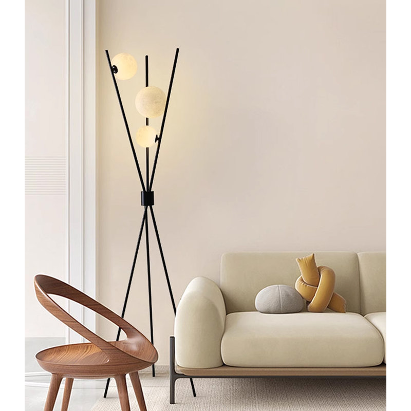 Élégante lampe sur pied à mât croisé avec abat-jour sphériques
