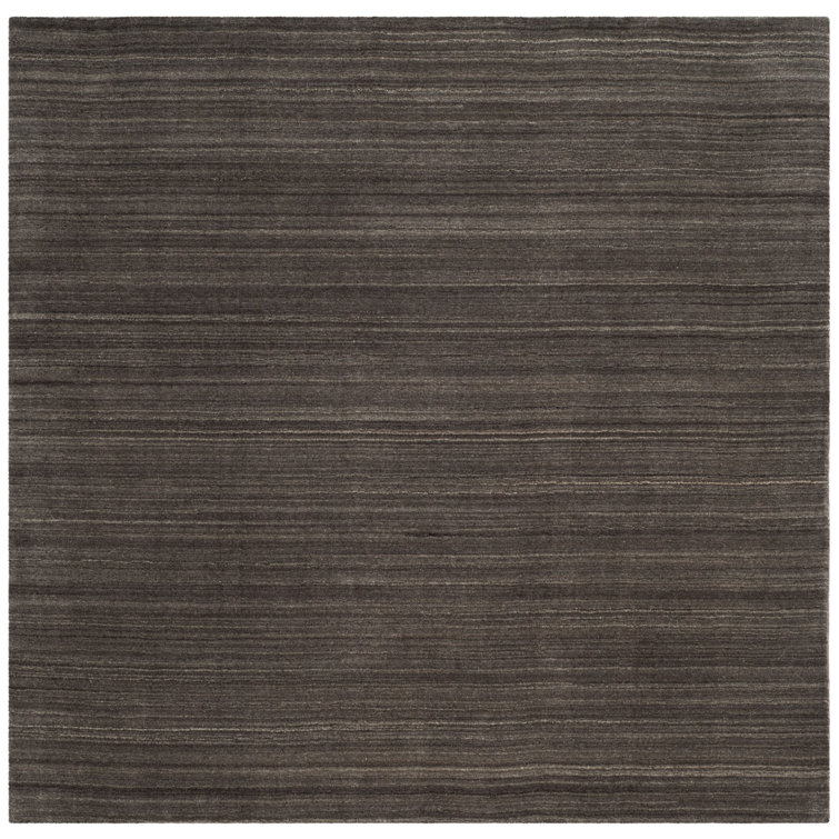 Thendara Hand Loomed Wool/Cotton Solid Color Rug in Charcoal