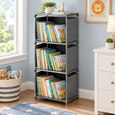 3 metal-and-fabric storage cubes make a compact bookshelf and organizer for smaller bedrooms or living rooms.