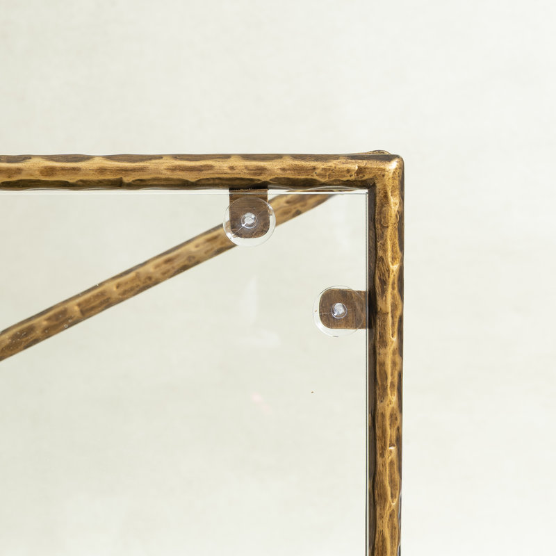 Table basse moderne en verre avec cadre en métal doré