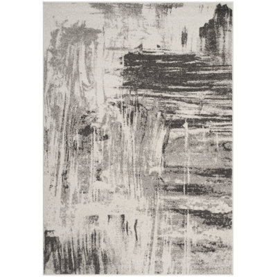 Riebe Abstract Ivory/Gray Area Rug