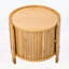 Table basse ronde rotative avec rotin et rangement caché, parfaite pour les espaces de vie élégants et fonctionnels.