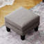 Repose-pieds en tissu gris clair