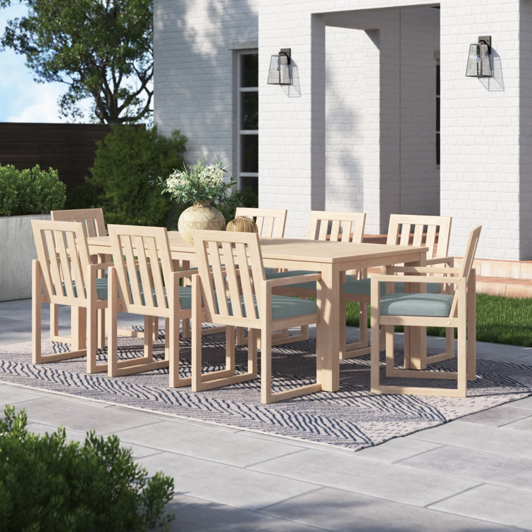 Sehrish 8 - Person Wood Patio Dining Set with Rectangular Table , Sunbrella® Cushions Included