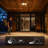 2-Light Matte Black Motion Activated Outdoor Flush Mount Ceiling Light with Ribbed Glass Shade and Frosted Glass Lens