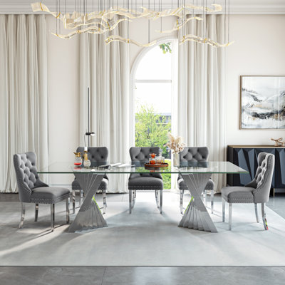 8-Person Glass Dining Set With Stainless Steel Base And Faux Leather Chairs