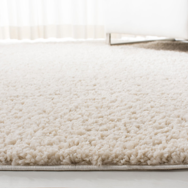 Brittney Performance solid color shag rug, Rond 6 pi 7 po