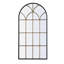 Miroir arqué noir et or de 34 po x 65,5 po de long, complément aux éléments décoratifs du salon dans la chambre à coucher