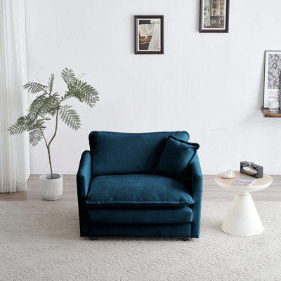 Fauteuil en chenille bleu pour se détendre