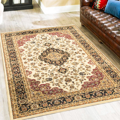 Tapis crème classique en polypropylène de 10 pi 6 po x 14 pi avec motif médaillon d'apparence et d'aspect élégant