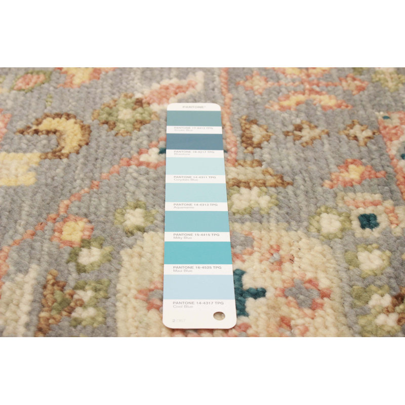 Tapis bleu clair en laine noué à la main 4 pi 11 po x 8 pi 0 po Jules Serapi