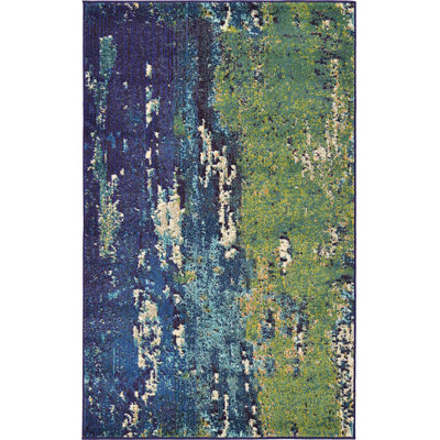 Tapis bleu marine à motif géométrique shirey