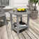 Harada 18 Inch Round Outdoor Side Table Adirondack Plastic/Resin Patio Side Table Weather Resistant End Table with Storage Shelf