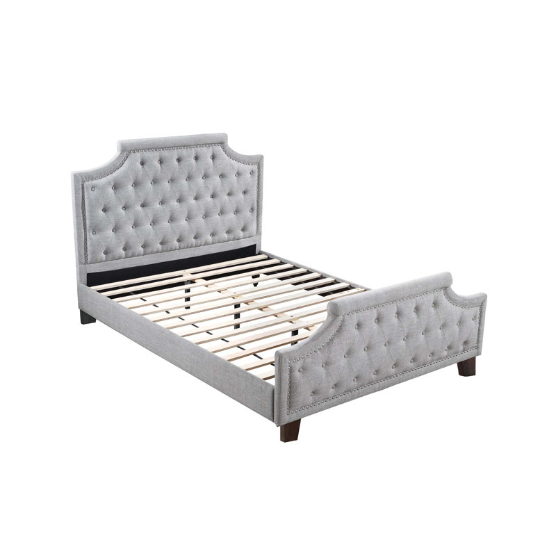 Lit double confortable et élégant avec tête et pied de lit rembourrés pour une expérience de chambre à coucher relaxante