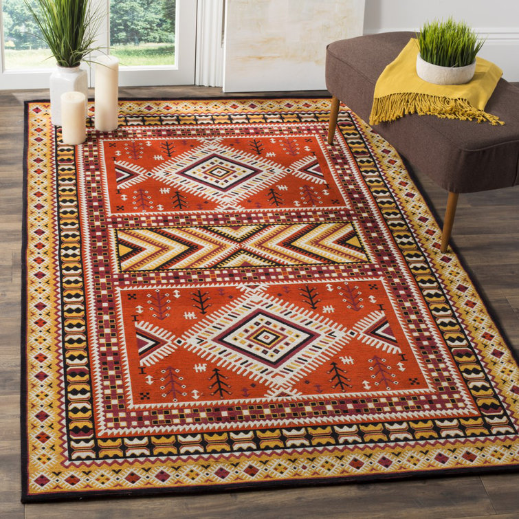 Tapis orange / or Aderito