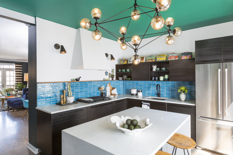 vintage lunch boxes on cabinets
