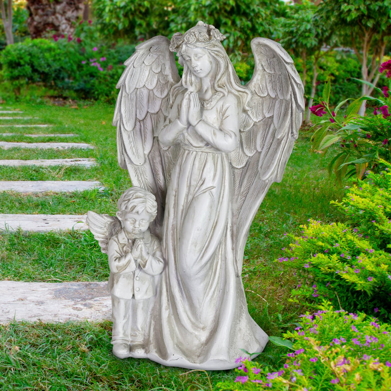 Statue ange à DEL avec halo à DEL et garçon