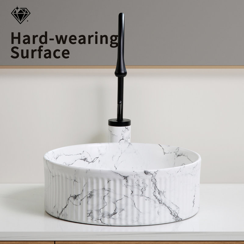 Lavabo vasque rond en marbre noir et blanc pour salle de bain