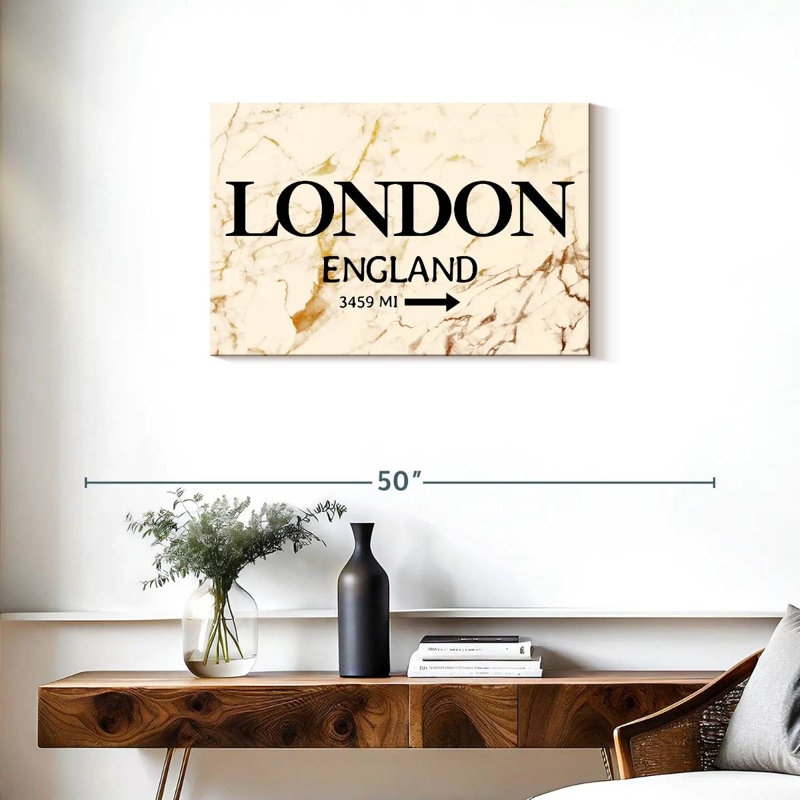 Enseigne Nicci London, H 20 po x l 30 po