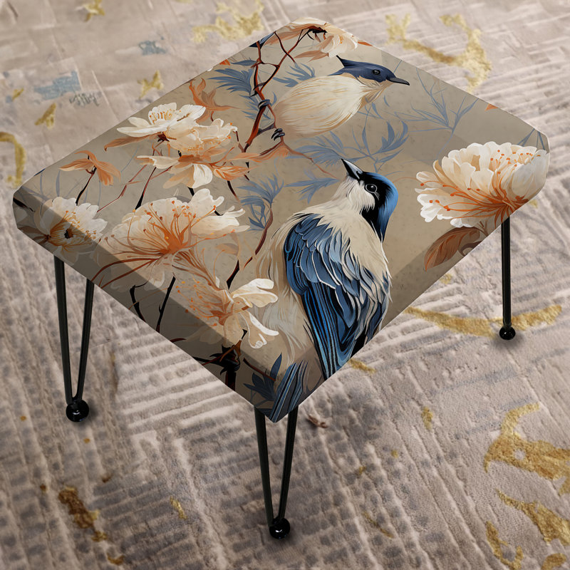 Repose-pieds beige et bleu à motif floral