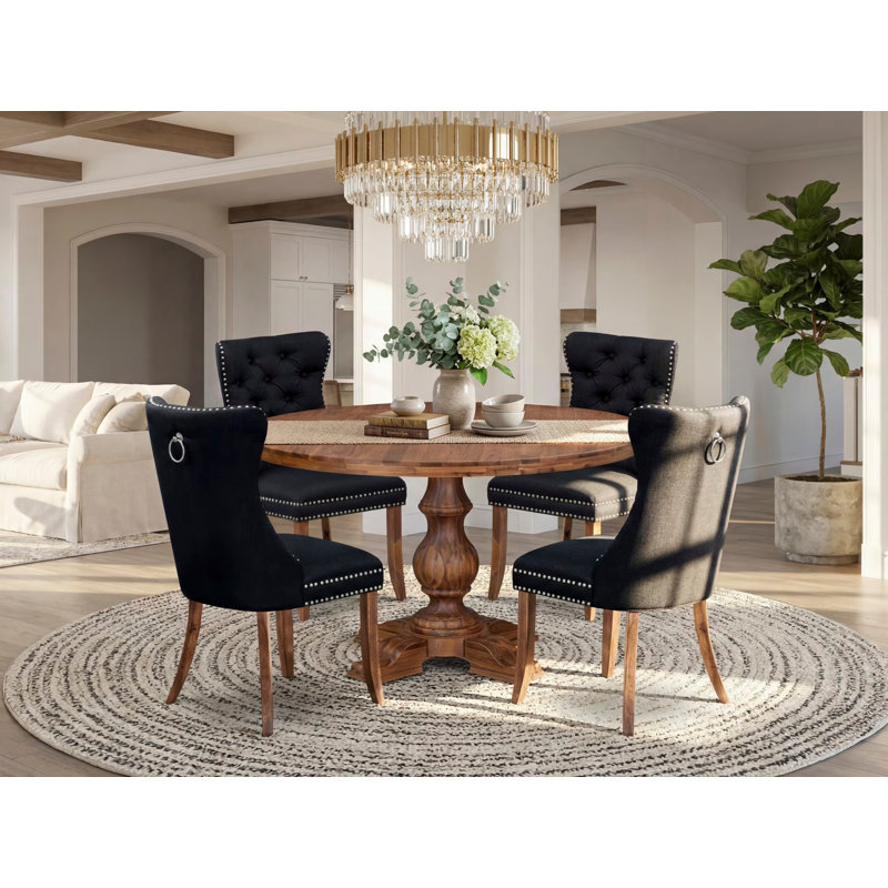 Ensemble de salle à manger 5 pièces en polyester 4 chaises rembourrées noires, dossier capitonné et table ronde de 54 po au fini noyer antique.