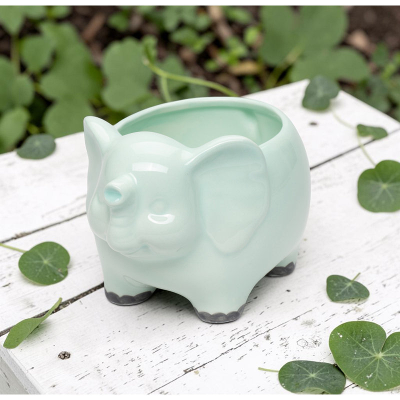 Petit pot de fleurs vert éléphant