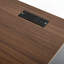 Bureau en L en coin avec huche arquée, station de charge et plateau à clavier