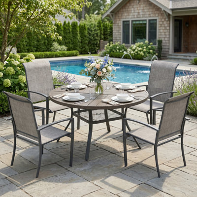 4-Person Round Patio Dining Set With Stackable Textilene Chairs