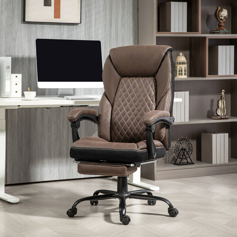 Fauteuil brun foncé ergonomique avec repose-pieds réglable en hauteur et inclinable pour les longues séances de travail