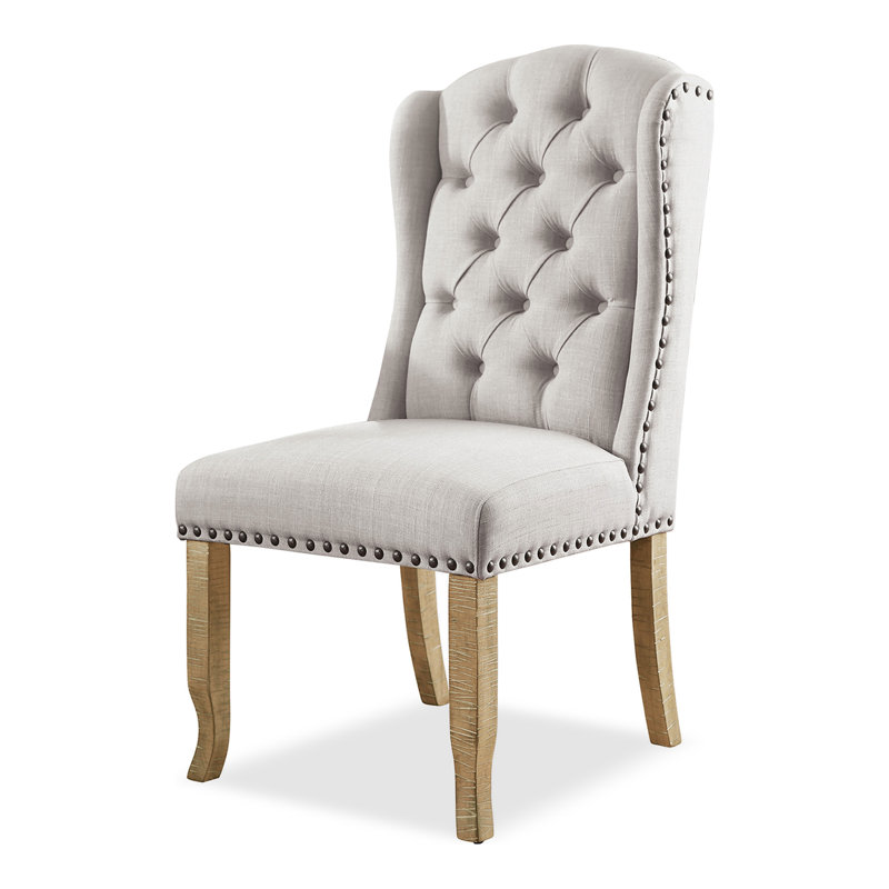 Chaise d'appoint rembourrée à oreilles capitonnée ivoire Wilfrid