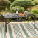 Alyah Rectangular 6 - Person 64" Long Dining Table with Cushions