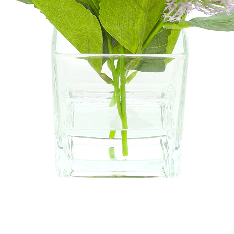 Globe Thistle Arranged in Glass Vase